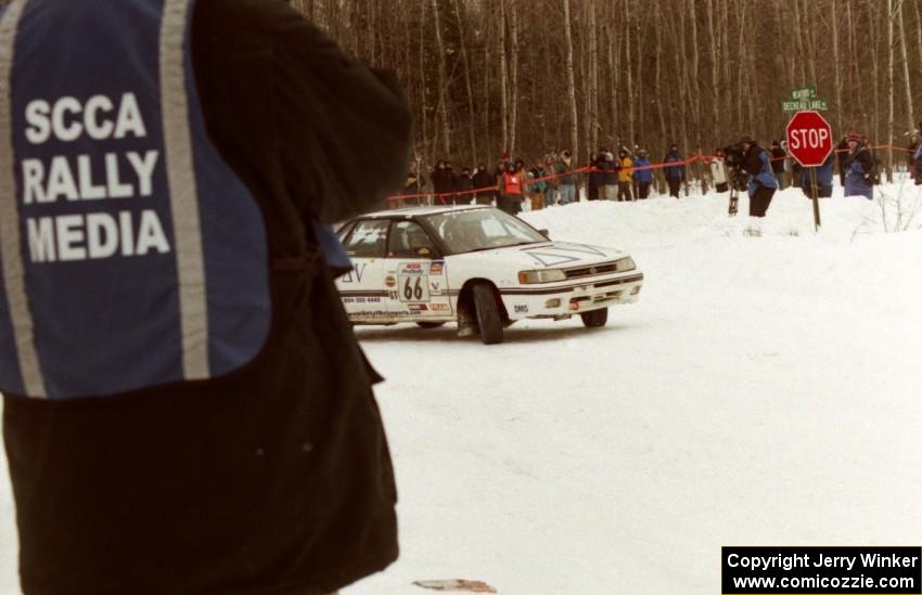 Pete Kuncis gets a clearer shot of the Ted Mendham / Lise Mendham Subaru Legacy on SS12 (Meaford)