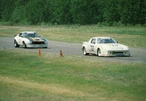 Glen Brown's Mazda RX-7 and Bill Cammack's Datsun 280Z battle for the C Production win