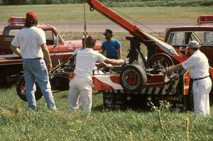 Terry Orr's Lola T-440 Formula Ford gets lifted onto the flatbed