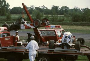 Terry Orr's Lola T-440 Formula Ford gets lifted onto the flatbed next to ???'s Van Dieman RF84 Formula Ford