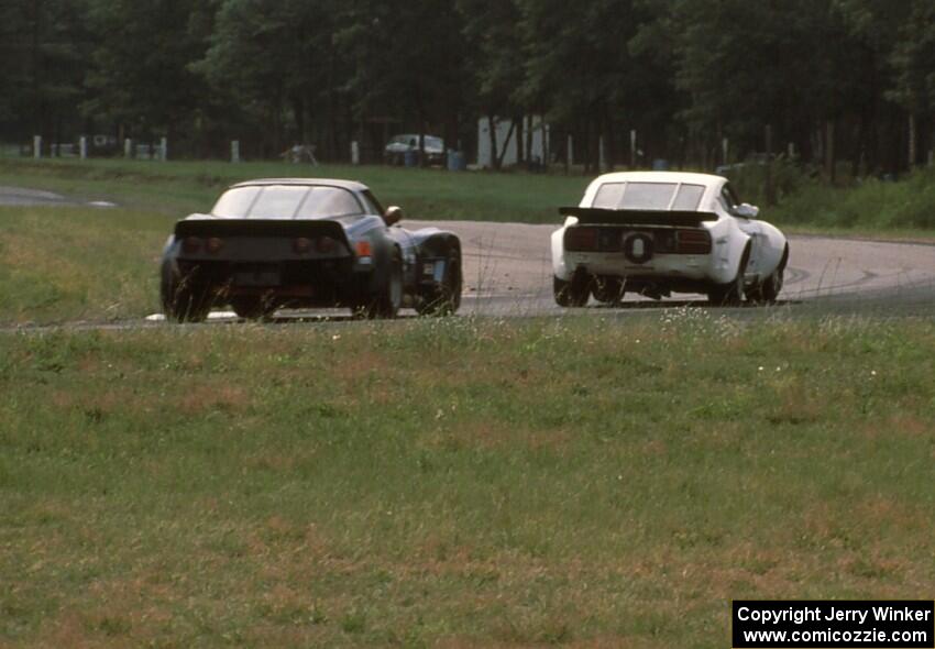 Bill Cammack's GT-2 Datsun 280Z and Bruce Gunderson's GT-1 Chevy Corvette through turn 6