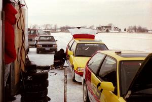 (9) Jeff Kuida / Ahmad Khodar and (6) Leighton Reese / Peter Cunningham Team Honda Civic Si's in the pits.