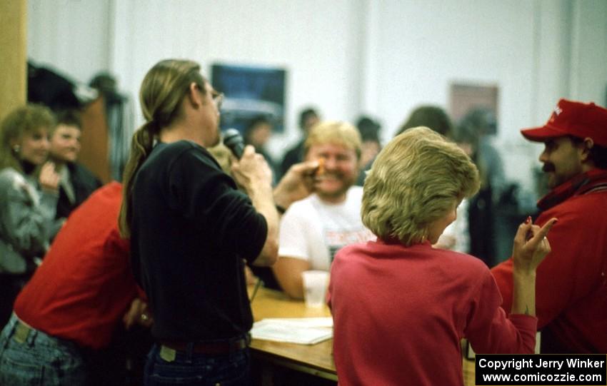 Mike "Hippy" Wall, owner of OHV Motors, calls off the number on a raffle ticket.