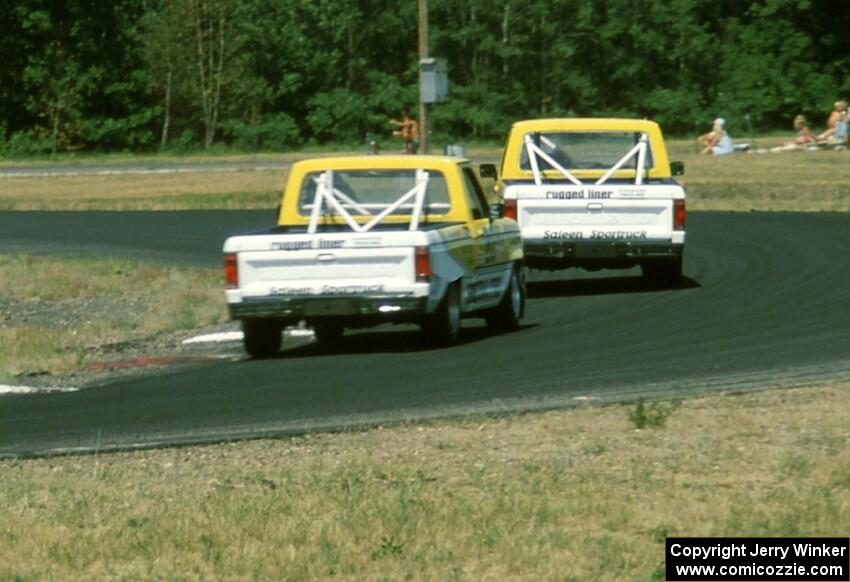 Steve Saleen's and George Follmer's Ford Rangers head through turn 4