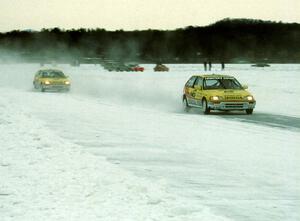 Peter Cunningham / Leighton Reese and Parker Johnstone / Jeff Kuida Honda Civic Si's head down the front straight