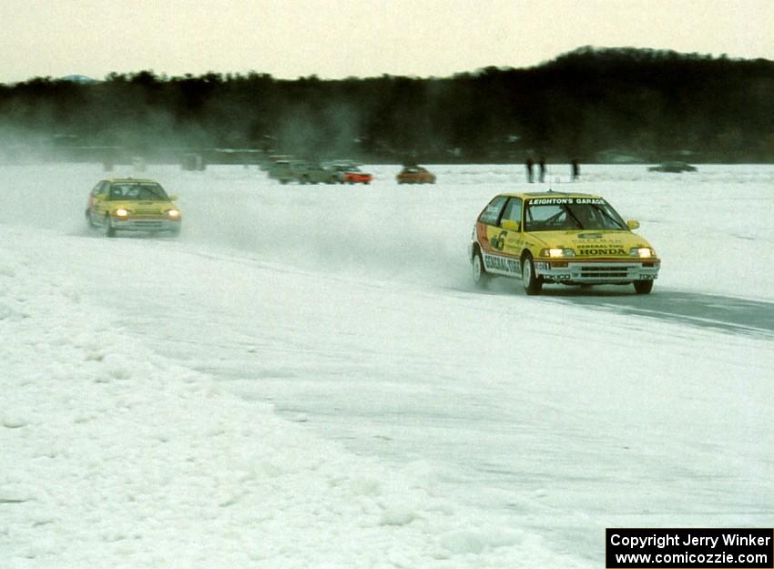 Peter Cunningham / Leighton Reese and Parker Johnstone / Jeff Kuida Honda Civic Si's head down the front straight