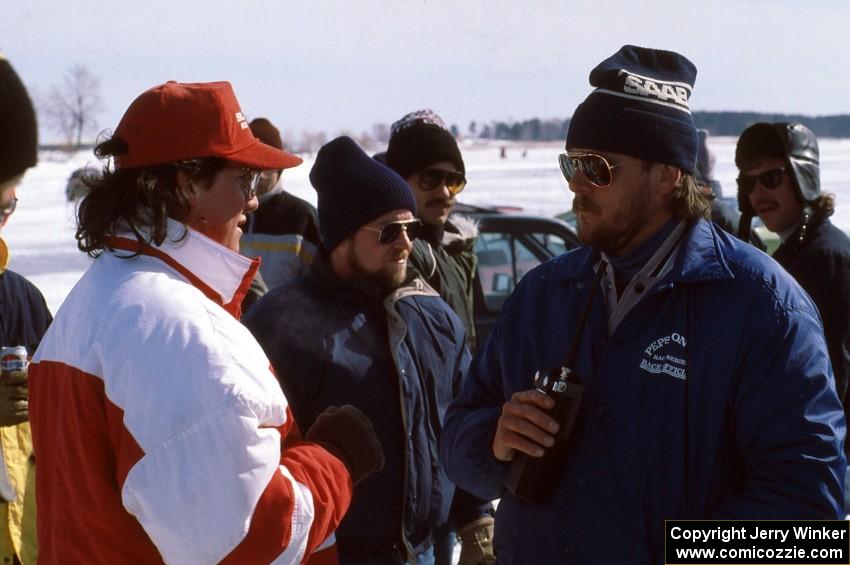 Chris Orr chats with Mark Sanders after the race is cancelled.