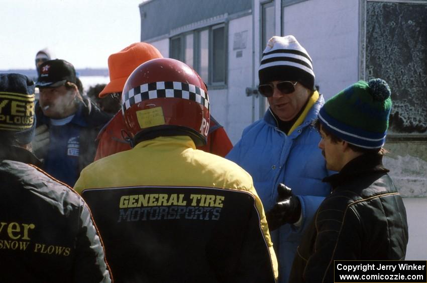 An official tries to explain to Peter Cunningham his reasoning on cancelling the race.