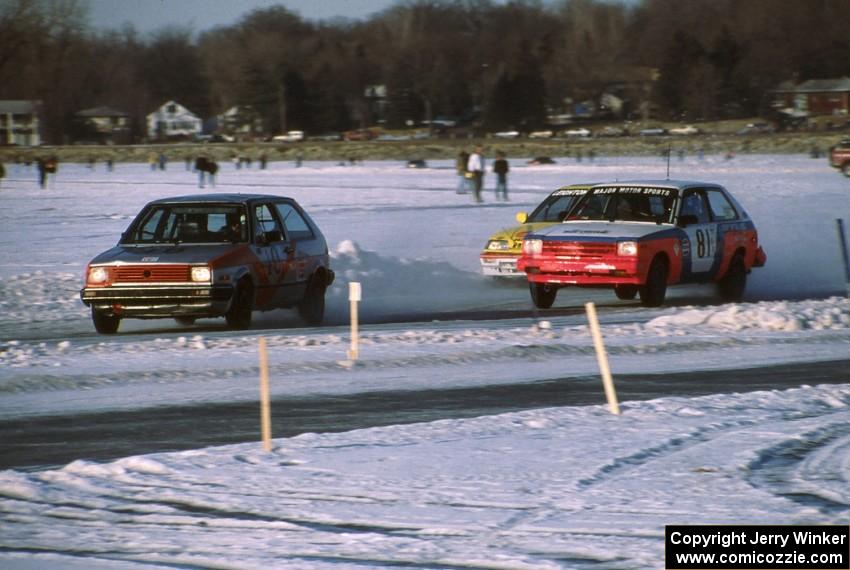 Keith Malterer / Peter Hansel VW Golf is chased by the Dave Souther / Gary Nelson Toyota Starlet and one of the factory Hondas