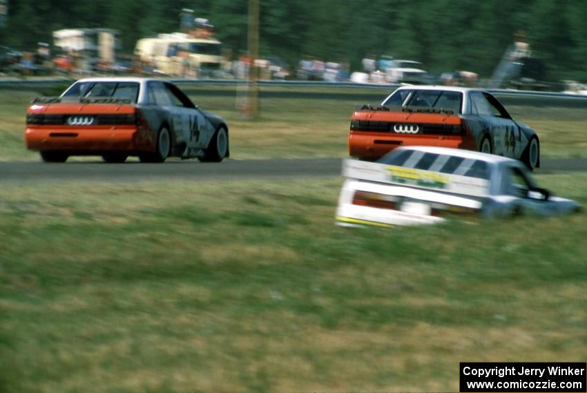 The Group 44 Audi 200 Quattros of (14) Hans Stuck and (44) Hurley Haywood on the cool off lap