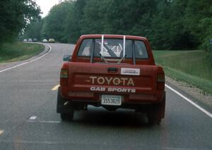 Gary Gooch/ Judy Gooch en route to Saturday's stages in their Toyota pickup.