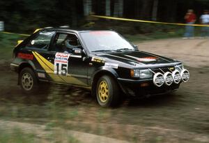 Erik Zenz / Brian Berg blast through a hairpin in their Mazda 323GTX.