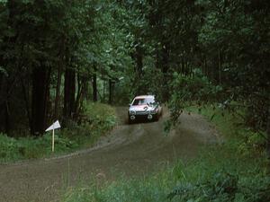 Jeff Zwart / Cal Coatsworth in their Mazda 323GTX prepare for a hairpin.