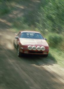 Doug Shepherd / J. Jon Wickens in the Dogde Daytona try to catch the car ahead of them, Choinere's Audi.