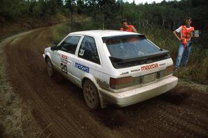 Steve Potter / Jeff Delahorne blast off from the start of the stage in their Mazda 323GTX.