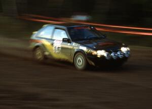 Erik Zenz / Brian Berg fly through the crossroads en route to fourth overall, second in open class in their Mazda 323GTX.