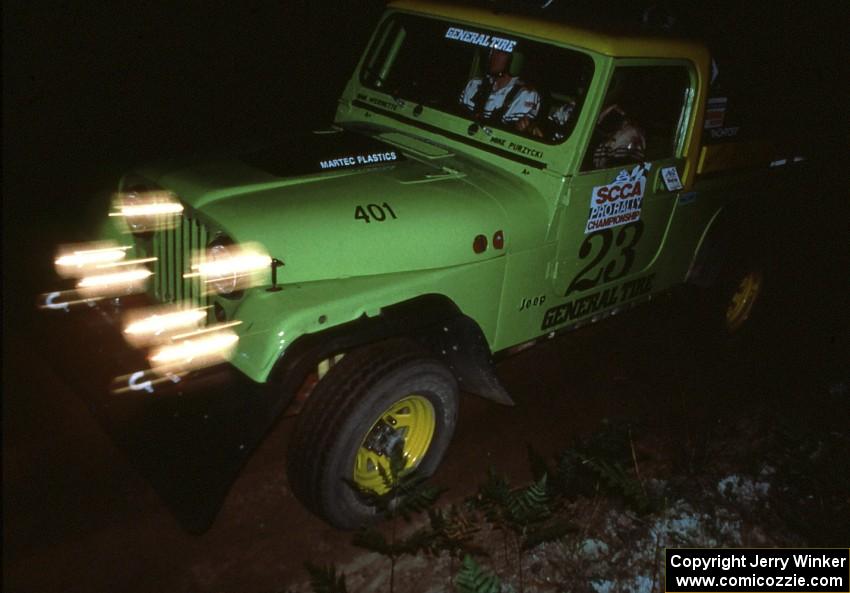 Mike Purzycki / Dan Werenette ran the club rallies in ther Jeep Scrambler seen here running on Friday night.