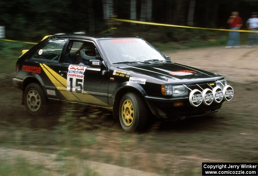 Erik Zenz / Brian Berg blast through a hairpin in their Mazda 323GTX.