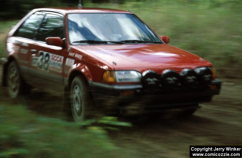 Dan Holt / Dave White in their PGT Mazda 323GTX.