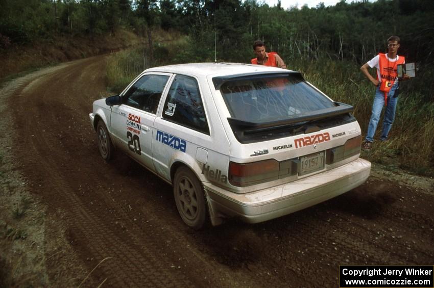 Steve Potter / Jeff Delahorne blast off from the start of the stage in their Mazda 323GTX.