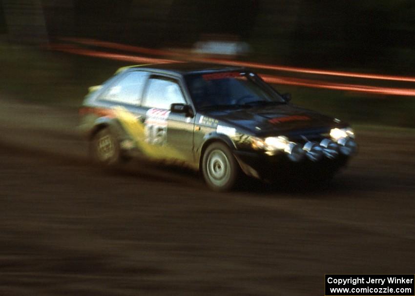 Erik Zenz / Brian Berg fly through the crossroads en route to fourth overall, second in open class in their Mazda 323GTX.