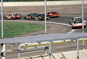 The field streams through turn one.