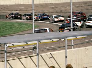 The field streams through turn one.