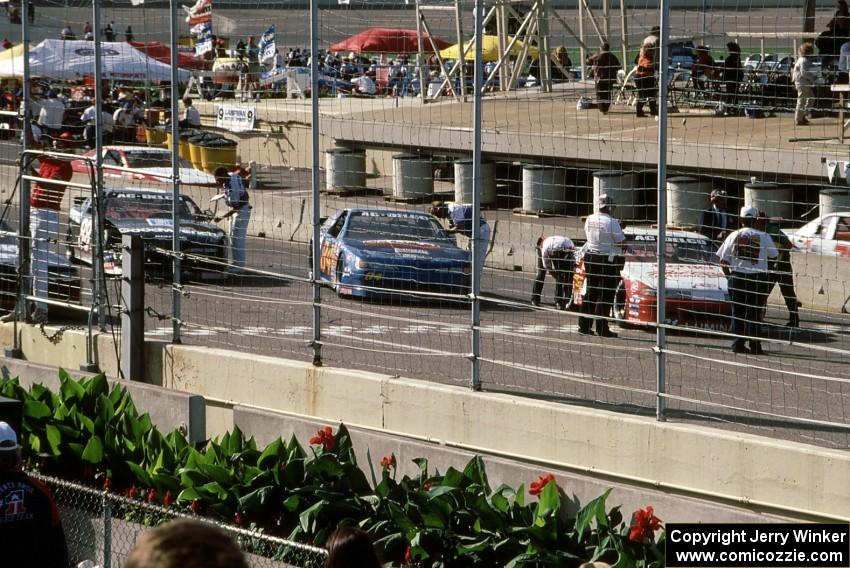 The Top 3: Johnny Benson, Jr.'s Chevy Lumina, Bob Senneker's Ford Thunderbird and Mike Eddy's Pontiac Grand Prix