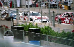 (48) Joe Nott's Ford Thunderbird and (10) Tony Roper's Chevy Lumina