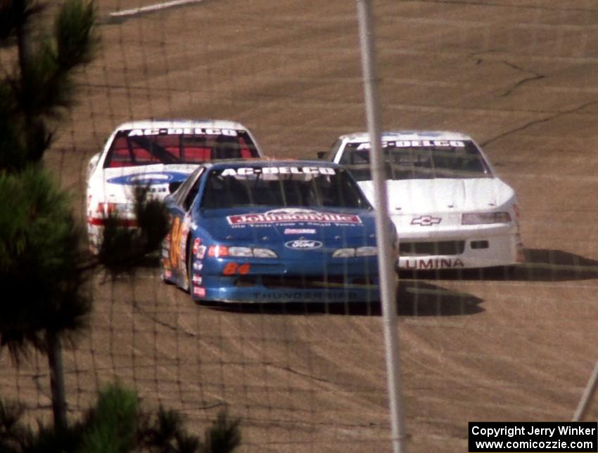 Bob Senneker and Butch Miller put a lap on Cindy Peterson