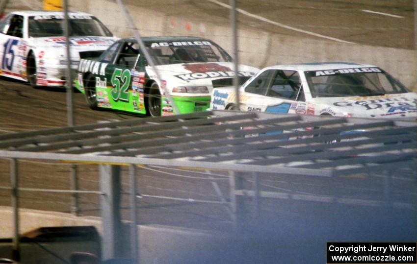 (1) Jay Sauter's Chevy Lumina, (52) Ken Schrader's Chevy Lumina and (15) Glenn Allen, Jr.s Pontiac Grand Prix