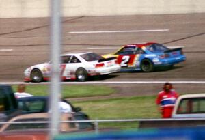 (87) Tony Raines' Pontiac Grand Prix and (2) Bobby Gill's Pontiac Grand Prix