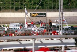 Mike Miller's Chevy Lumina and Mike Eddy's Pontiac Grand Prix tangle in turn 2