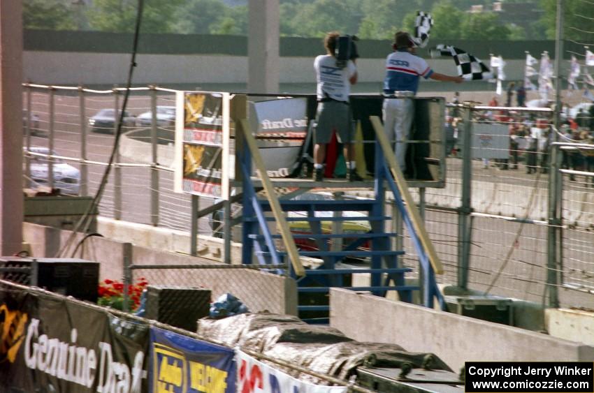 Bobby Gill's Pontiac Grand Prix takes the checkered flag