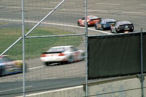 Cars enter turn one