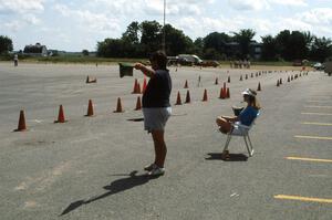 Greg Creamer waves the next driver onto the course