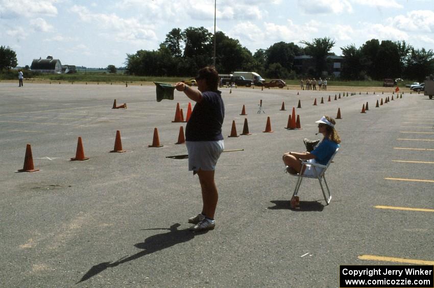 Greg Creamer waves the next driver onto the course