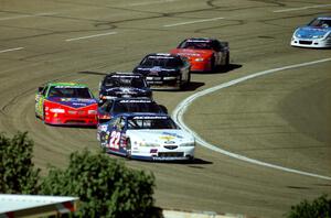 The leaders stream through turn 4