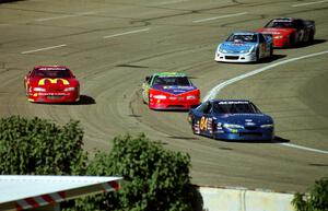 Senneker and Petty make a pass out of turn 4