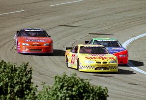 (23) Rick Beebe's Pontiac Grand Prix, (45) Adam Petty's Pontiac Grand Prix and (7) Gary St. Amant's Chevy Monte Carlo