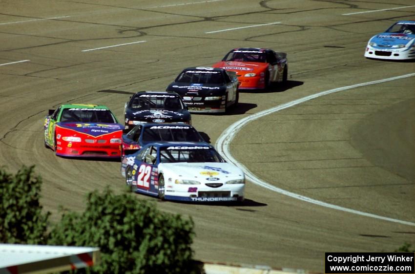 The leaders stream through turn 4