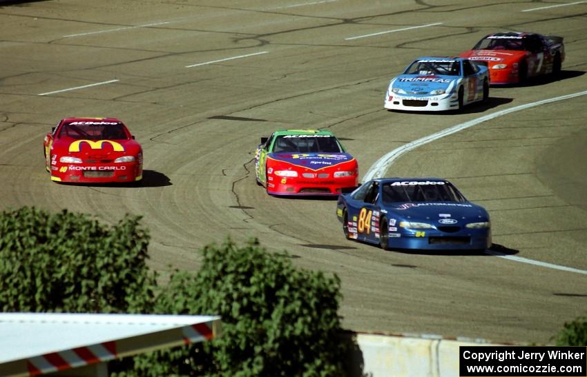 Senneker and Petty make a pass out of turn 4