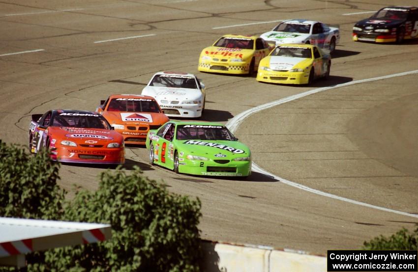 The field comes through turn 4