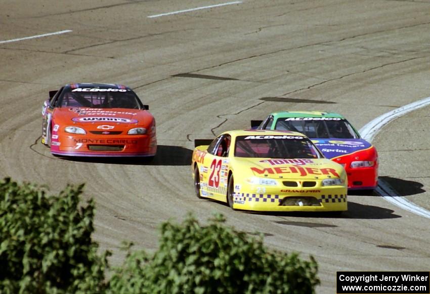 (23) Rick Beebe's Pontiac Grand Prix, (45) Adam Petty's Pontiac Grand Prix and (7) Gary St. Amant's Chevy Monte Carlo