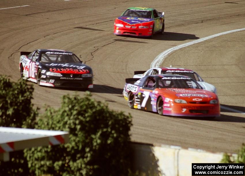 The leaders come out of turn 4 onto the front straight