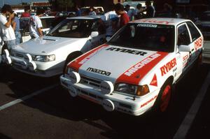 Jeff Zwart / Cal Coatsworth Mazda 323GTX alongside the new debuting factory Subaru Legacy of Chad DiMarco / Erick Hauge.