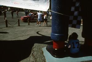 A 9-year old Emily Burton-Weinman watches cars leave the ceremonial start below the Paul Bunyan statue.