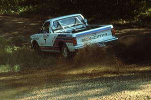 Guy Light / Jimmy Brandt exit out of the hairpin in their GMC Sonoma.