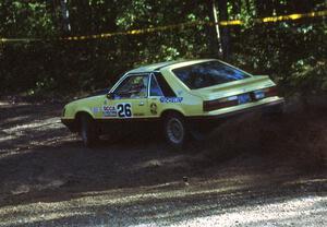 Don Rathgeber / Paul Bacina hit the throttle as they go uphill in their Ford Mustang.