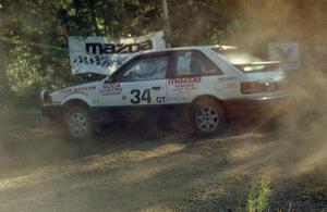 Staurt Sarasin / Joyce Sarasin decided to leave their one-year old son Kyle at home to rally in their PGT Mazda 323GTX.